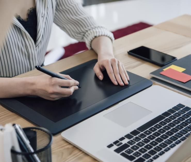 person designing on a computer